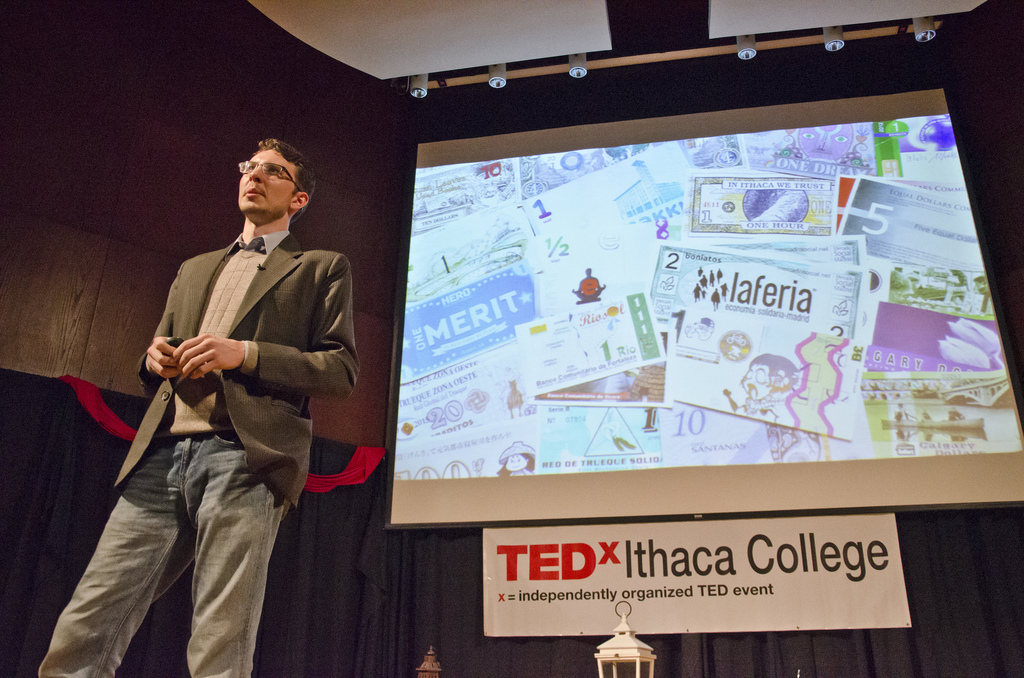 Scott Morris speaking at a conference on regenerative economics